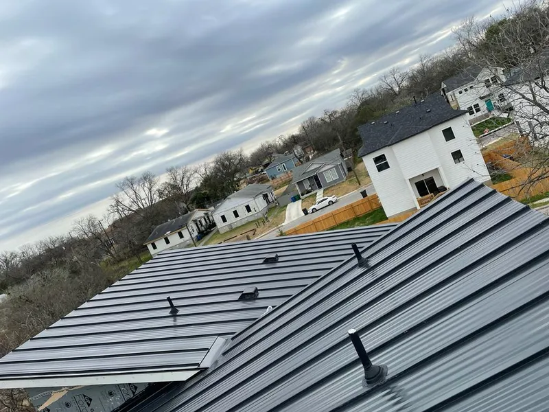 Standing seam metal roof panels with vents for Skylight Repair in Grandview